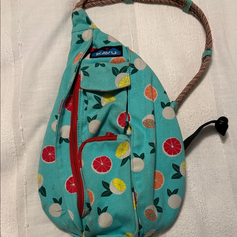KAVU Teal Sling Bag with Colorful Fruit Design